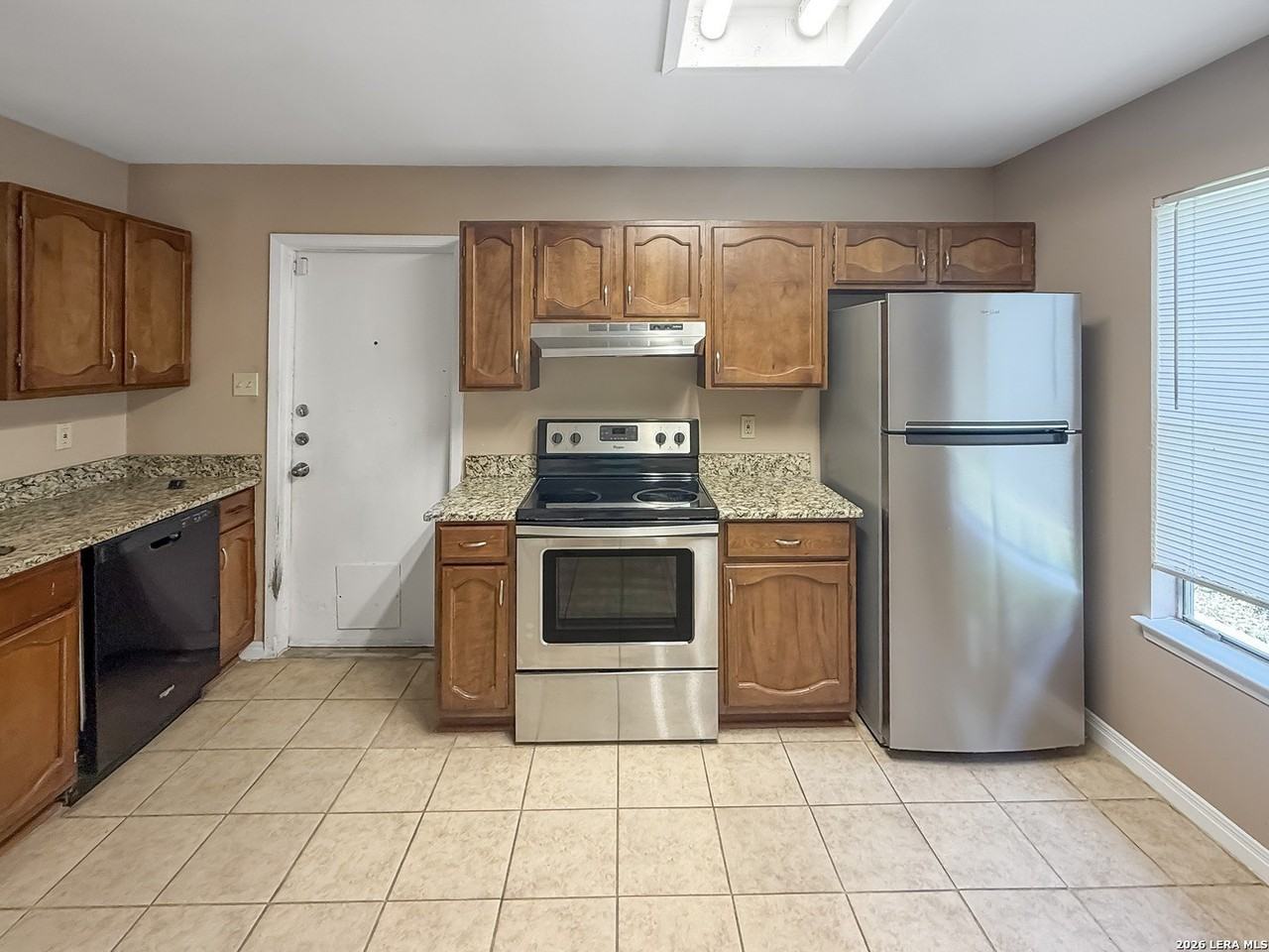 5958 Hidden Dale St - Photo 7 of 21