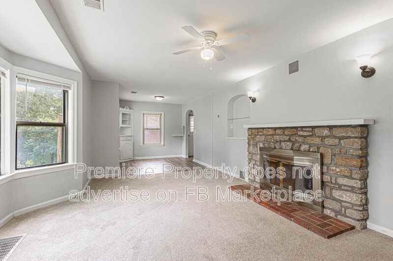 1107 W 27th St S - Photo 3 of 16
