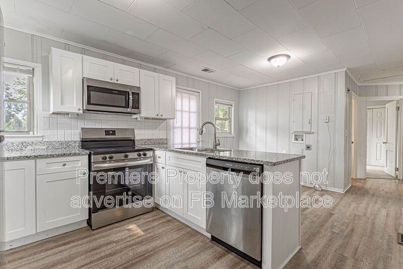 1107 W 27th St S - Photo 5 of 16