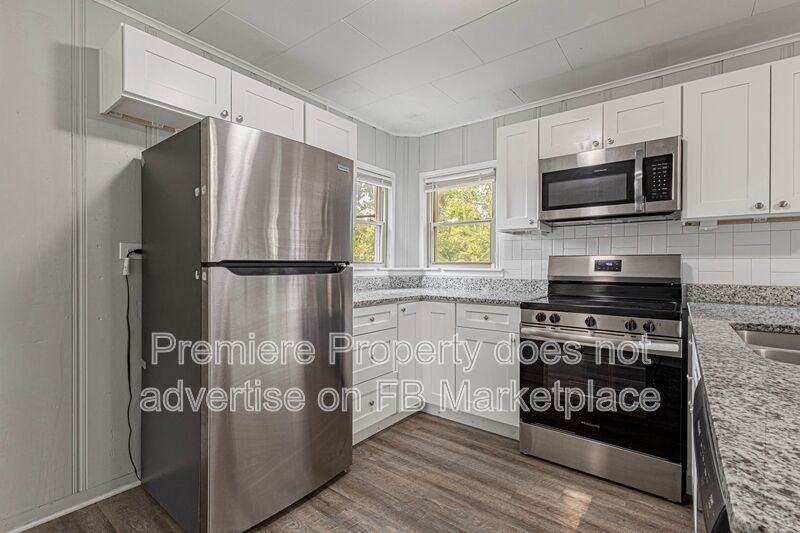 1107 W 27th St S - Photo 6 of 16