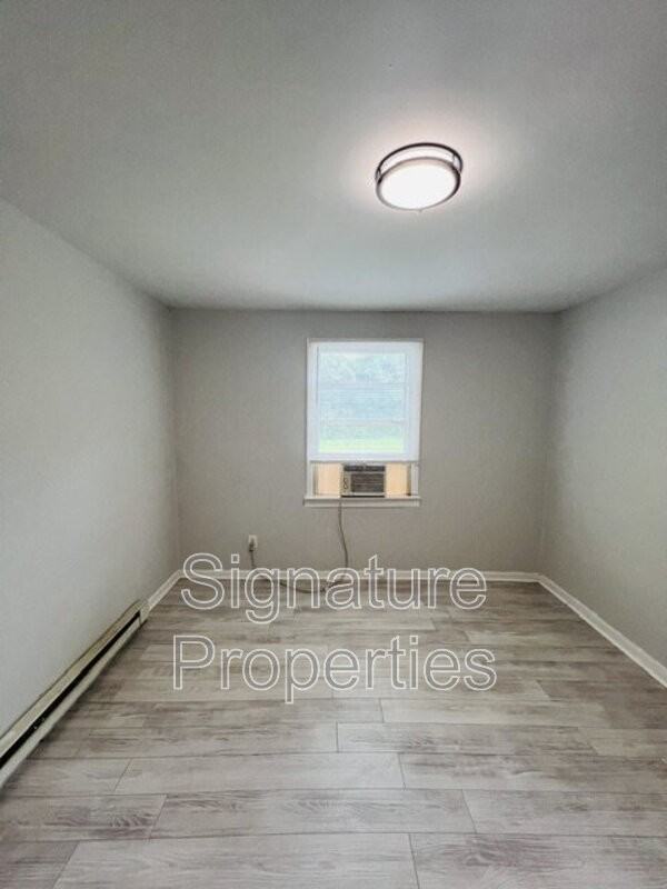 1221 Montgomery Ave - Photo 7 of 16