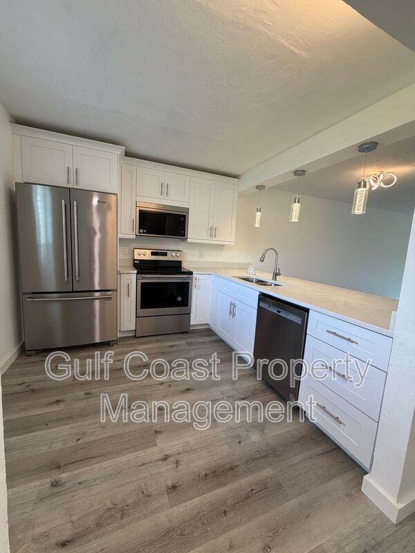 16150 Bay Pointe Blvd #107 - Photo 5 of 35