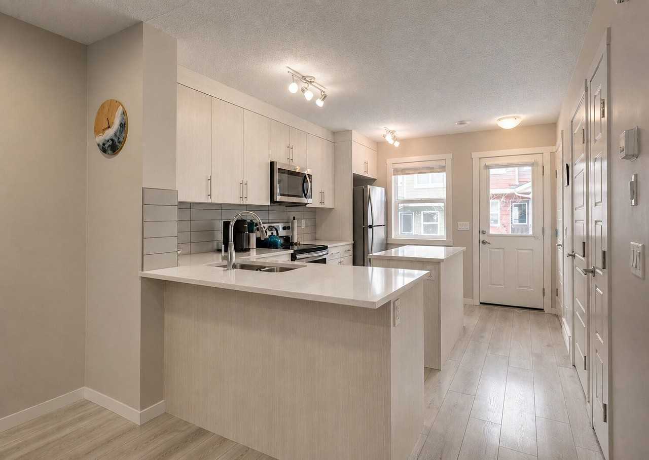 119 -119 Cranbrook Sq Se - Photo 3 of 18