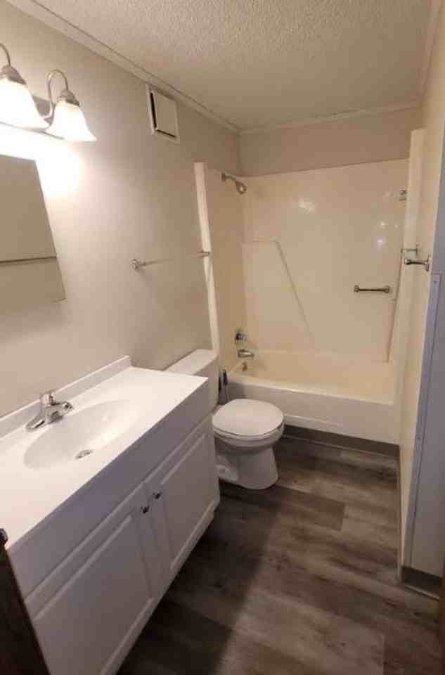 Cedar Gate Apartments LLC - Photo 3 of 12