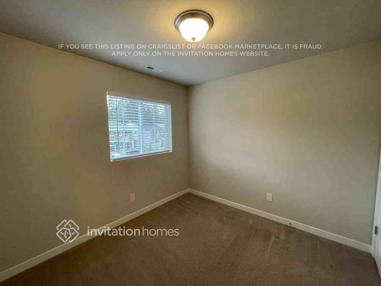 7724 208th Ave E - Photo 7 of 15