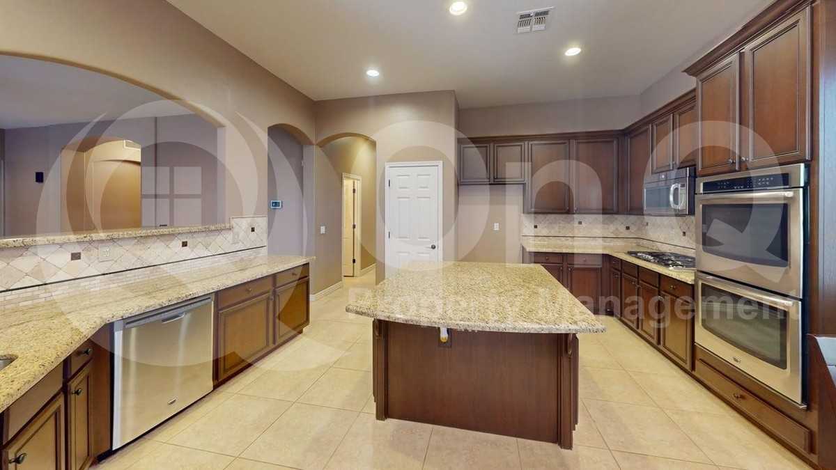 9648 E Lobo Ave - Photo 4 of 30