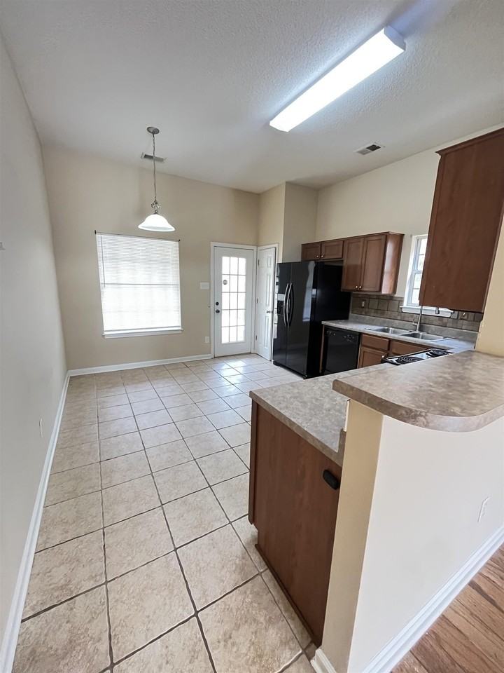 6836 Kamali Ave - Photo 5 of 16