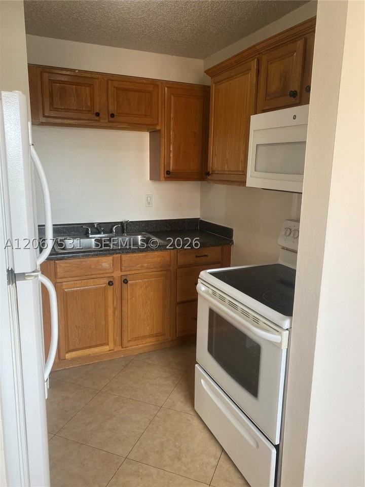 7279 W 24th Ave #246 - Photo 5 of 16
