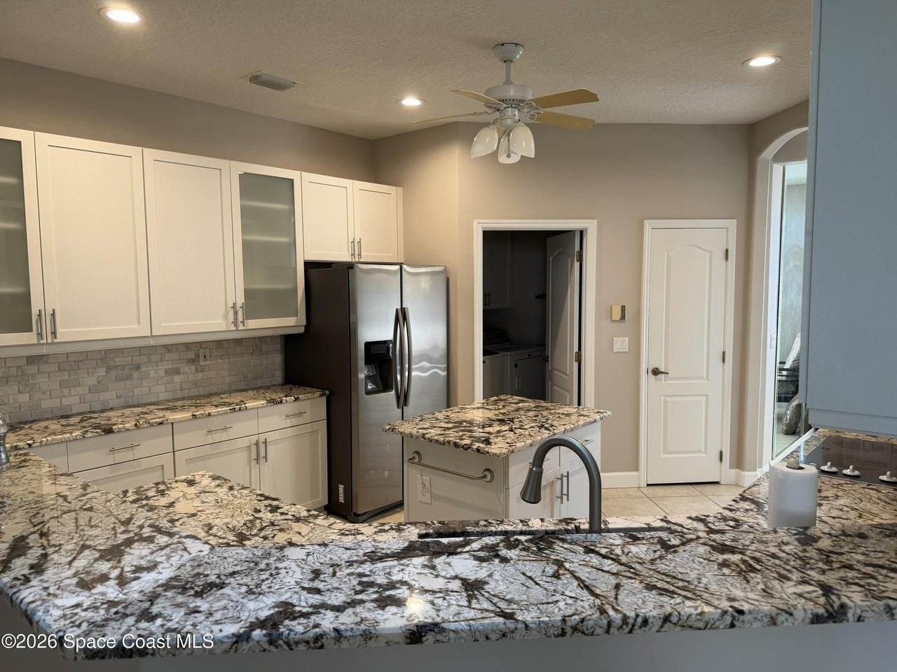 1251 S Banana River Dr - Photo 3 of 12