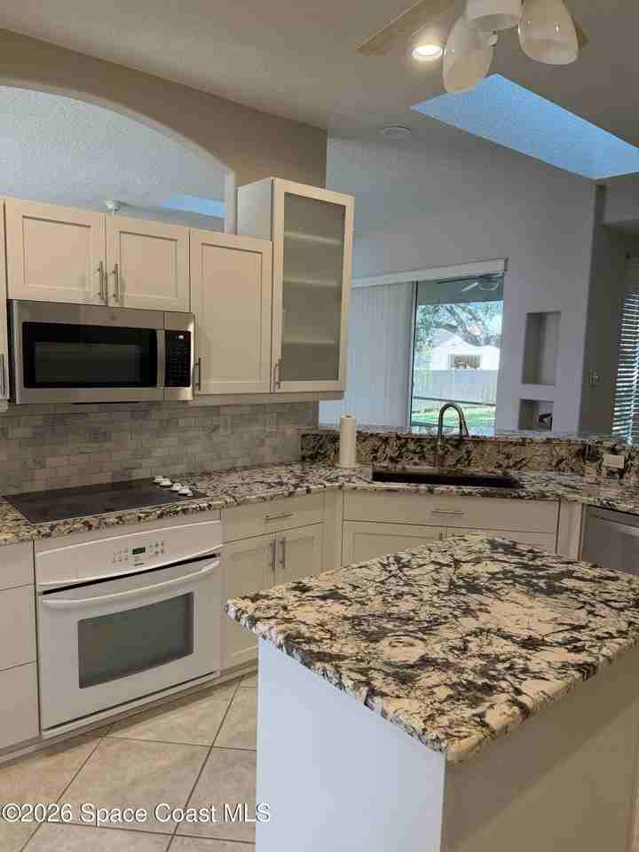 1251 S Banana River Dr - Photo 4 of 12