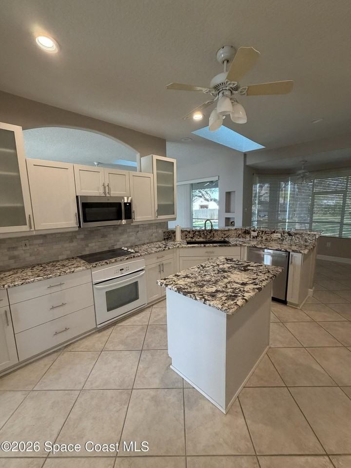 1251 S Banana River Dr - Photo 5 of 12