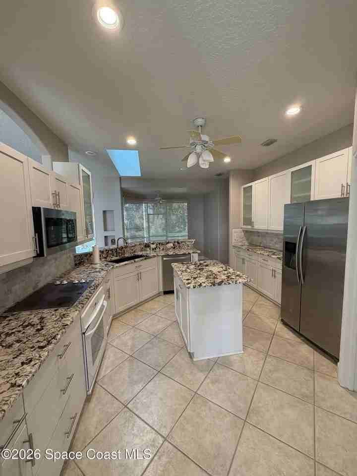 1251 S Banana River Dr - Photo 7 of 12