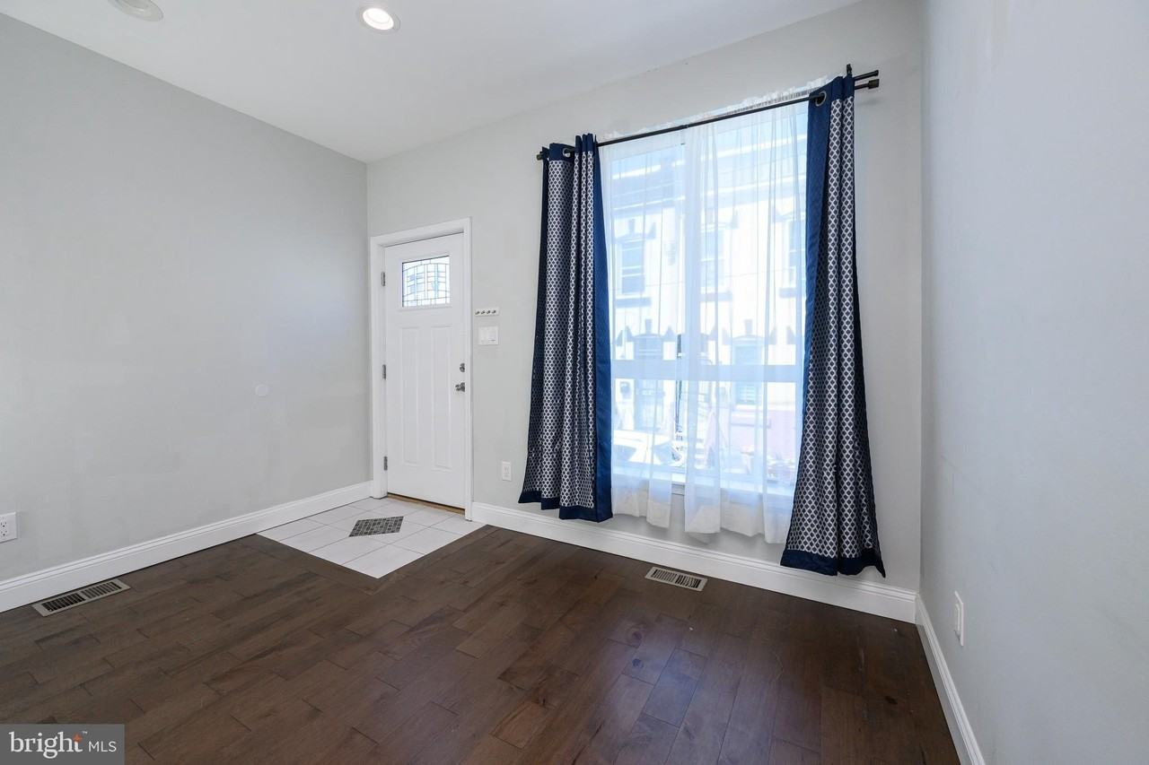 1439 N Newkirk St - Photo 6 of 35