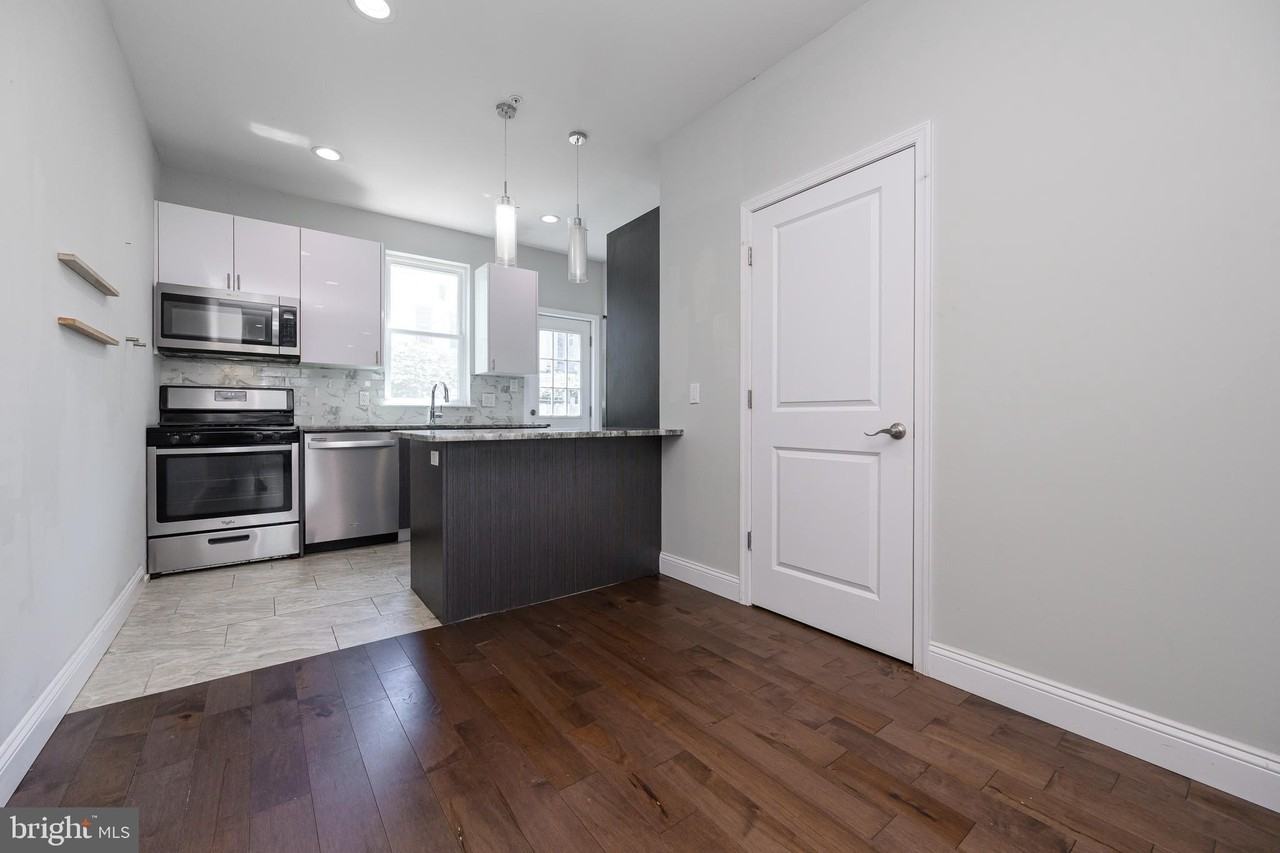 1439 N Newkirk St - Photo 7 of 35