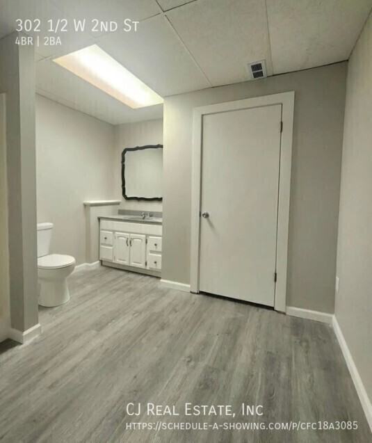 302 1/2 W 2nd St - Photo 6 of 7
