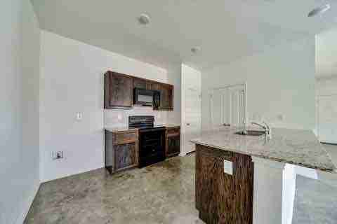6105 Amelia Earhart Blvd #B - Photo 5 of 26