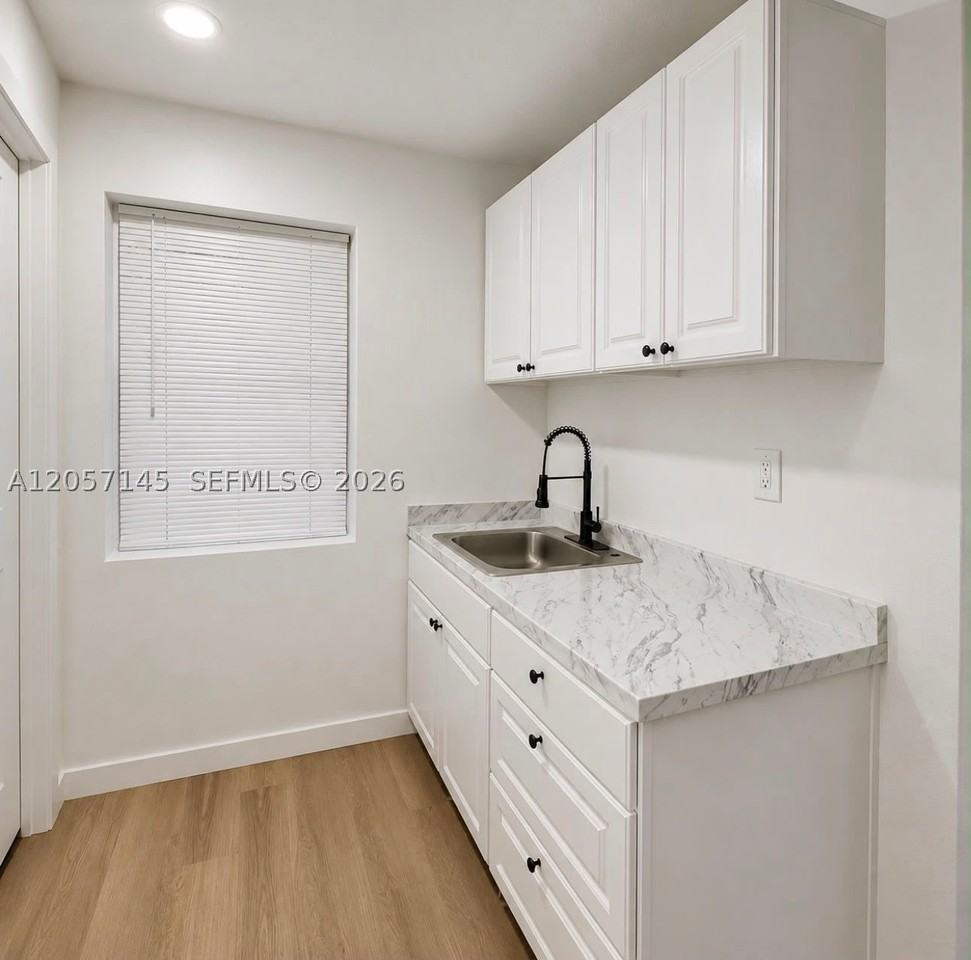 1461 Ne 56th St #1-3 - Photo 3 of 7