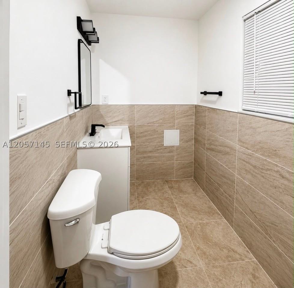 1461 Ne 56th St #1-3 - Photo 5 of 7