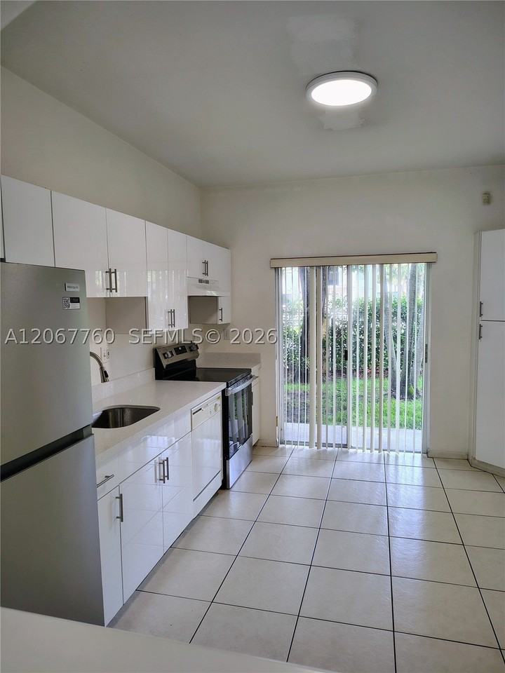 6990 Nw 179th St #101-2 - Photo 4 of 8