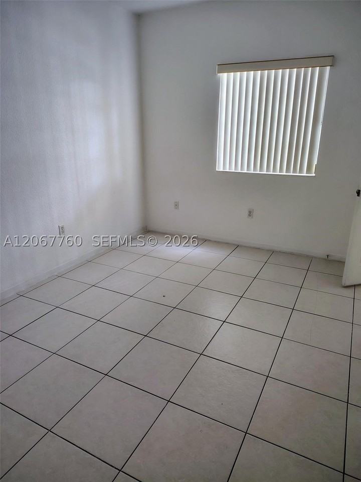 6990 Nw 179th St #101-2 - Photo 6 of 8