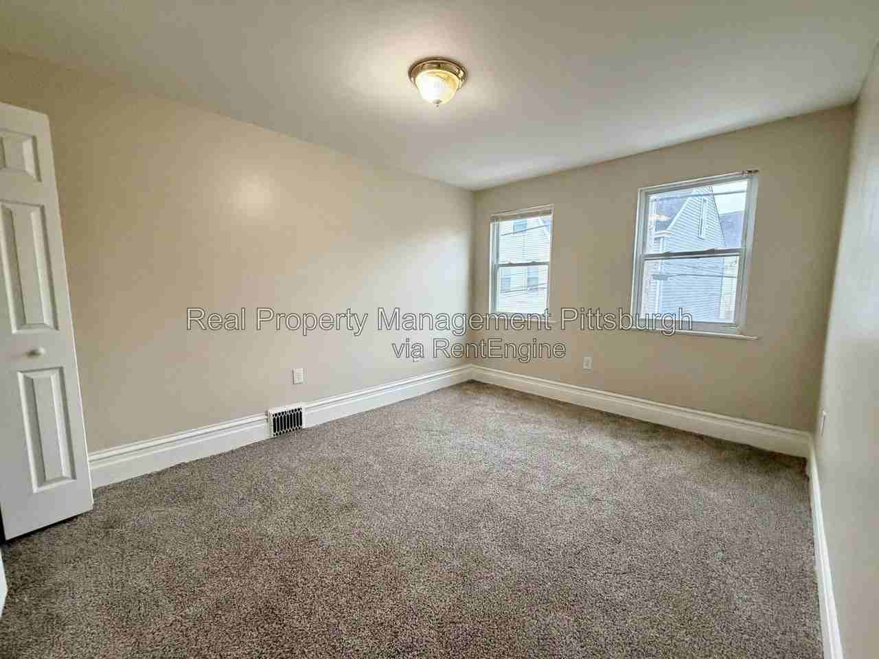 207 Edmond St - Photo 7 of 12