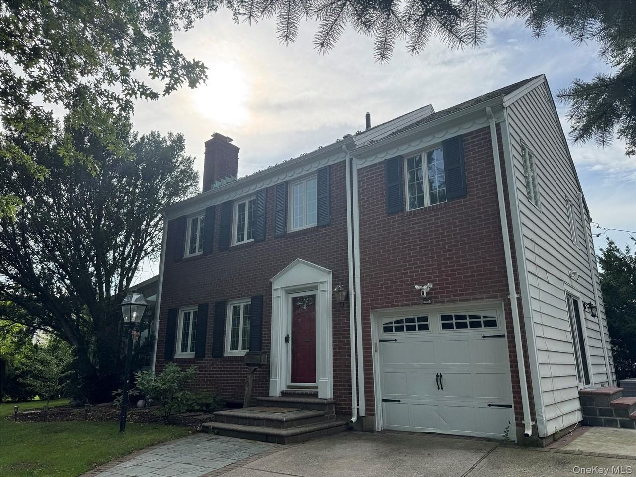 210 Clinton Rd - Photo 2 of 9