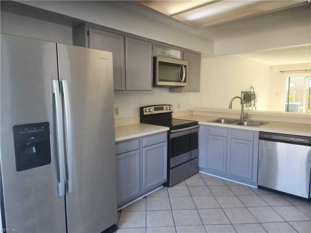 1408 Woodscape Ln - Photo 5 of 24