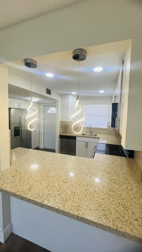 8345 Sunrise Lakes Blvd #304 - Photo 4 of 14