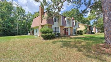 featured image of 1121 Woodfield Dr