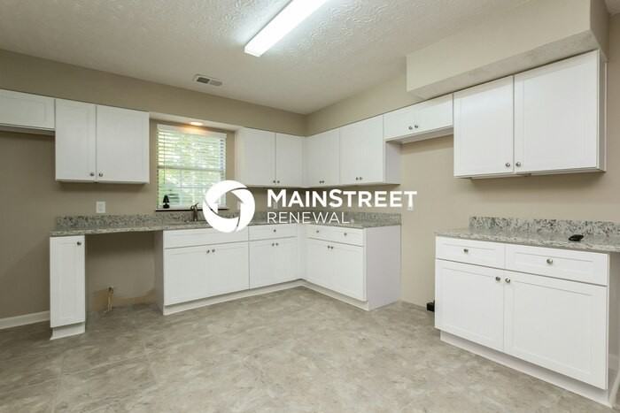 1901 Shadbark Ct Nw - Photo 5 of 15