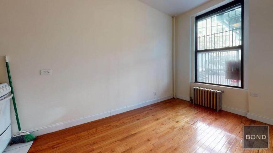 228 E 36th St - Photo 2 of 7