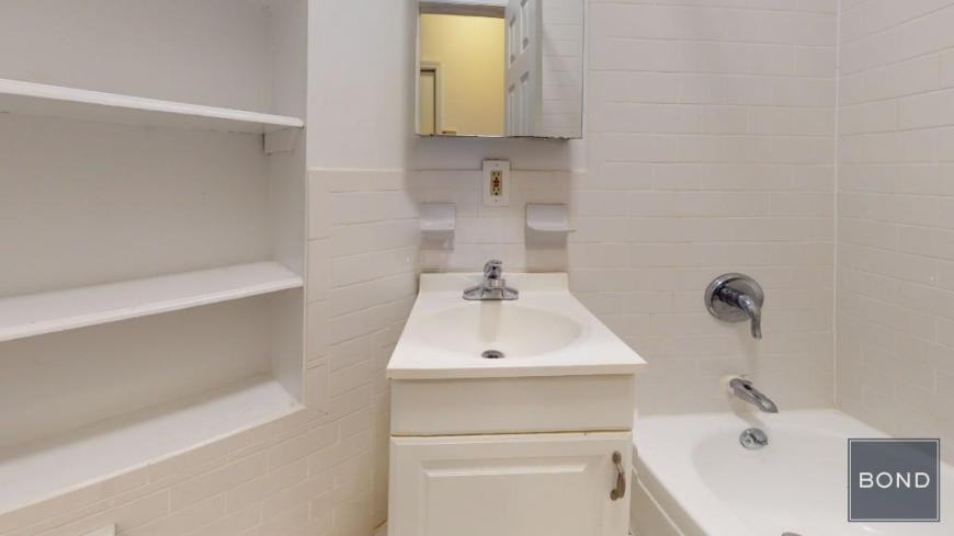 228 E 36th St - Photo 5 of 7