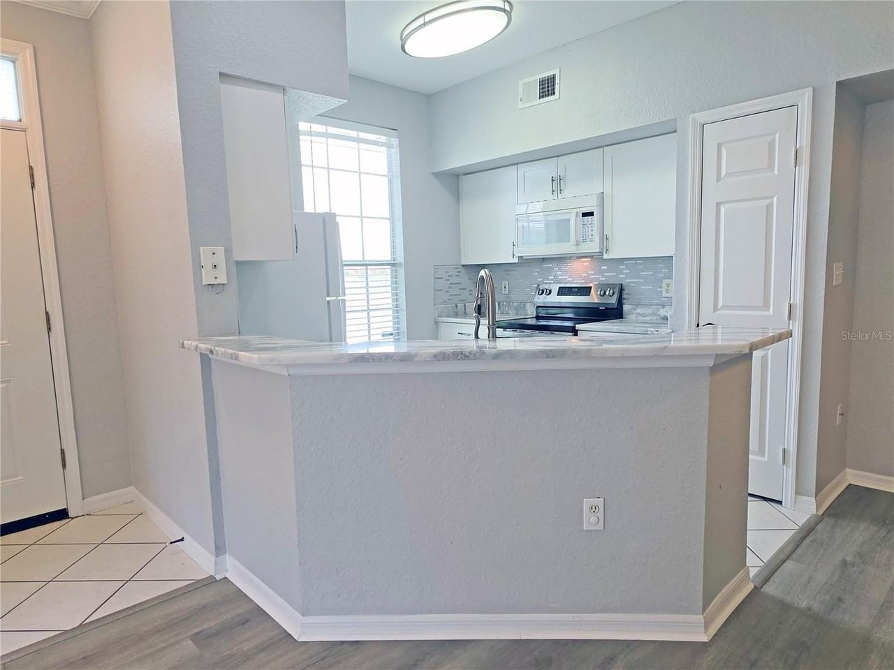 9018 Lake Chase Island Way #9018 - Photo 6 of 39