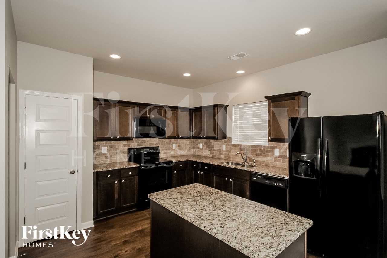 11848 Lovejoy Crossing Blvd - Photo 6 of 15