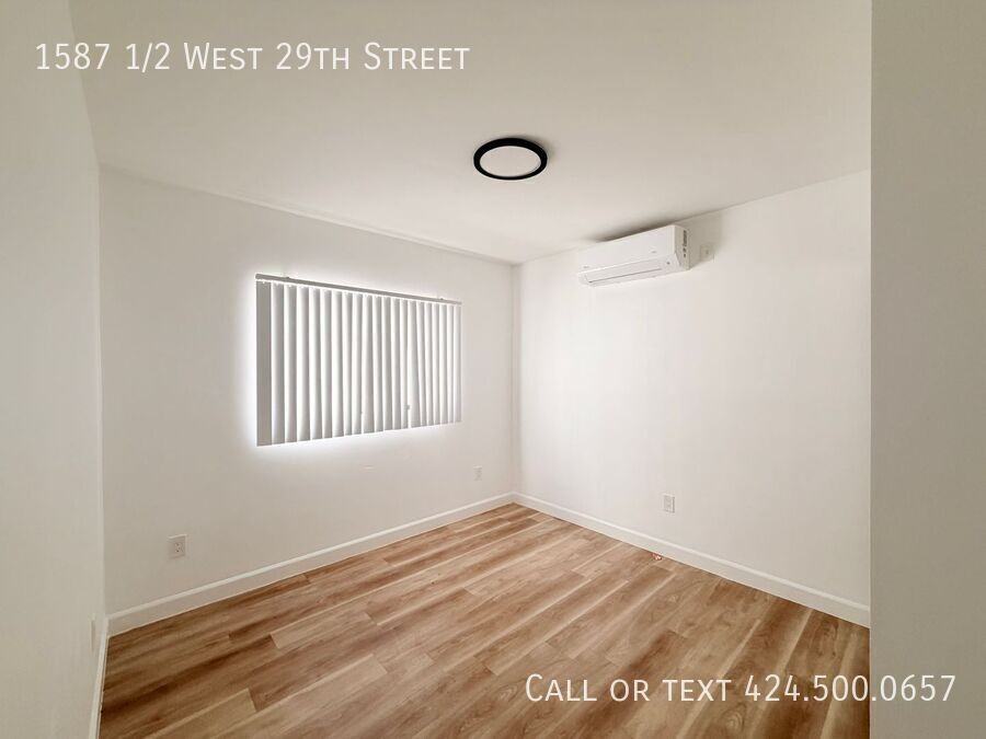 1587 1/2 W 29th St - Photo 3 of 15