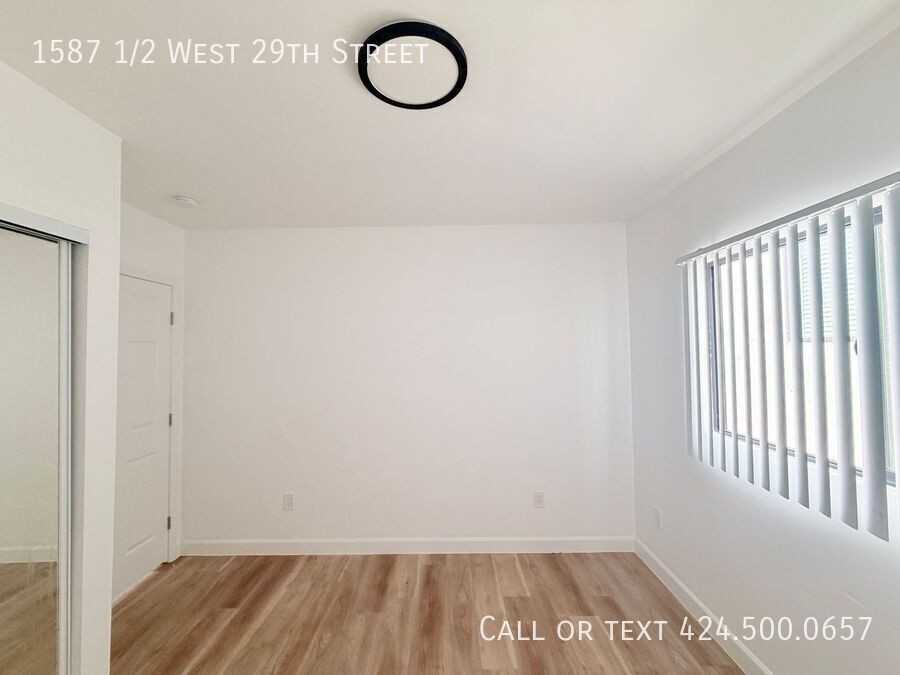 1587 1/2 W 29th St - Photo 4 of 15