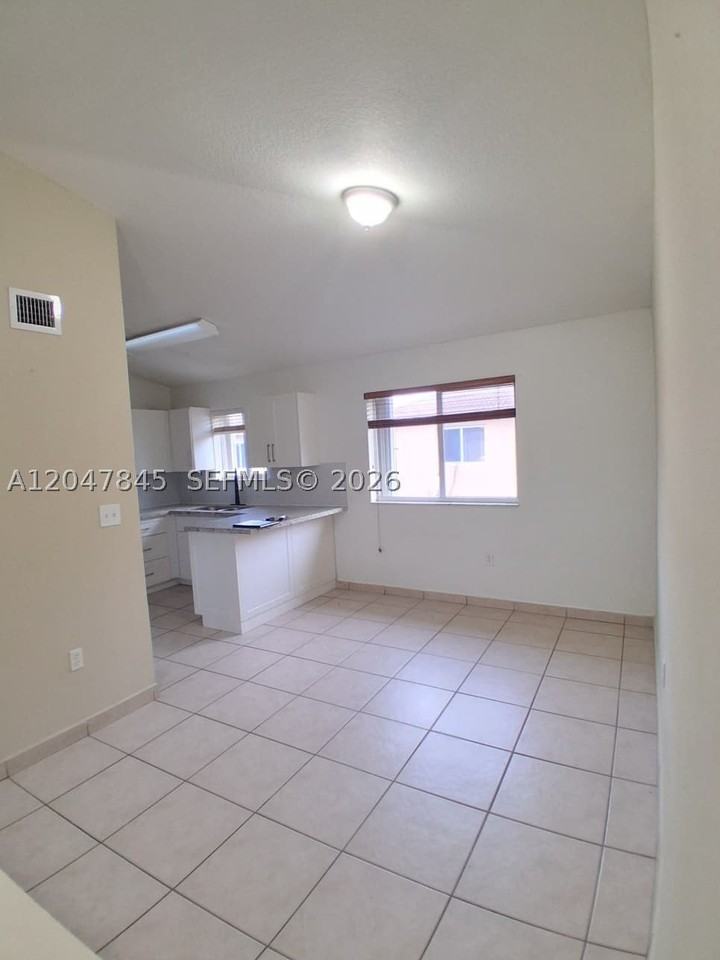 17318 Nw 74th Ave #202 - Photo 6 of 24