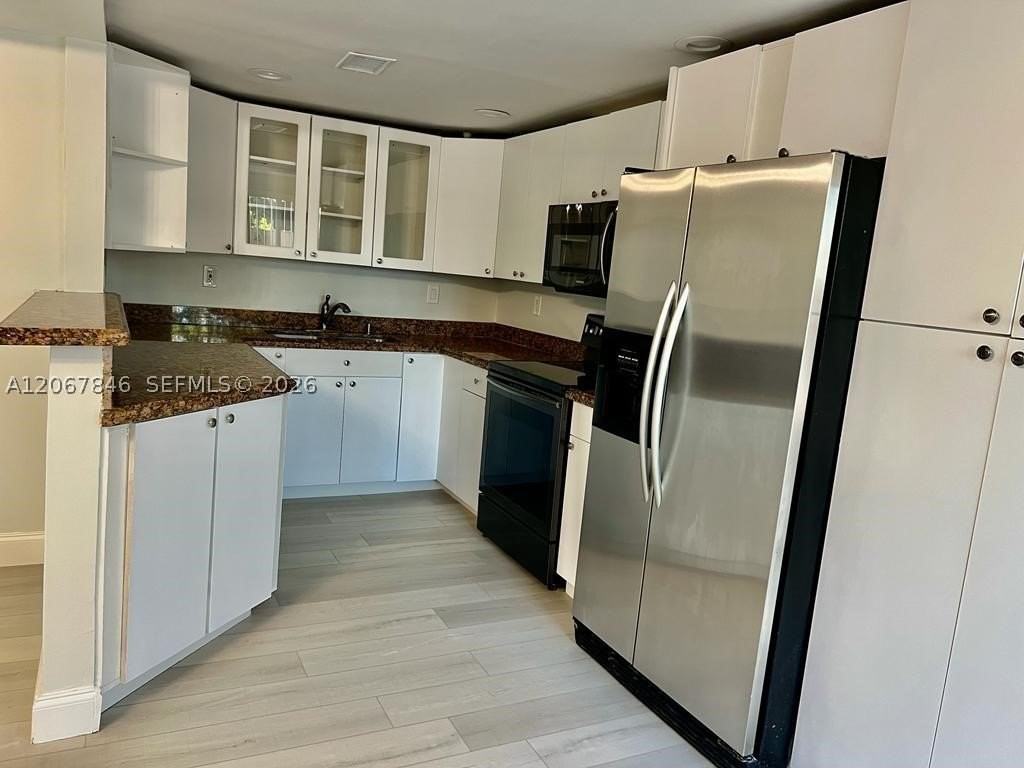 900 Sw 113th Ter - Photo 7 of 35