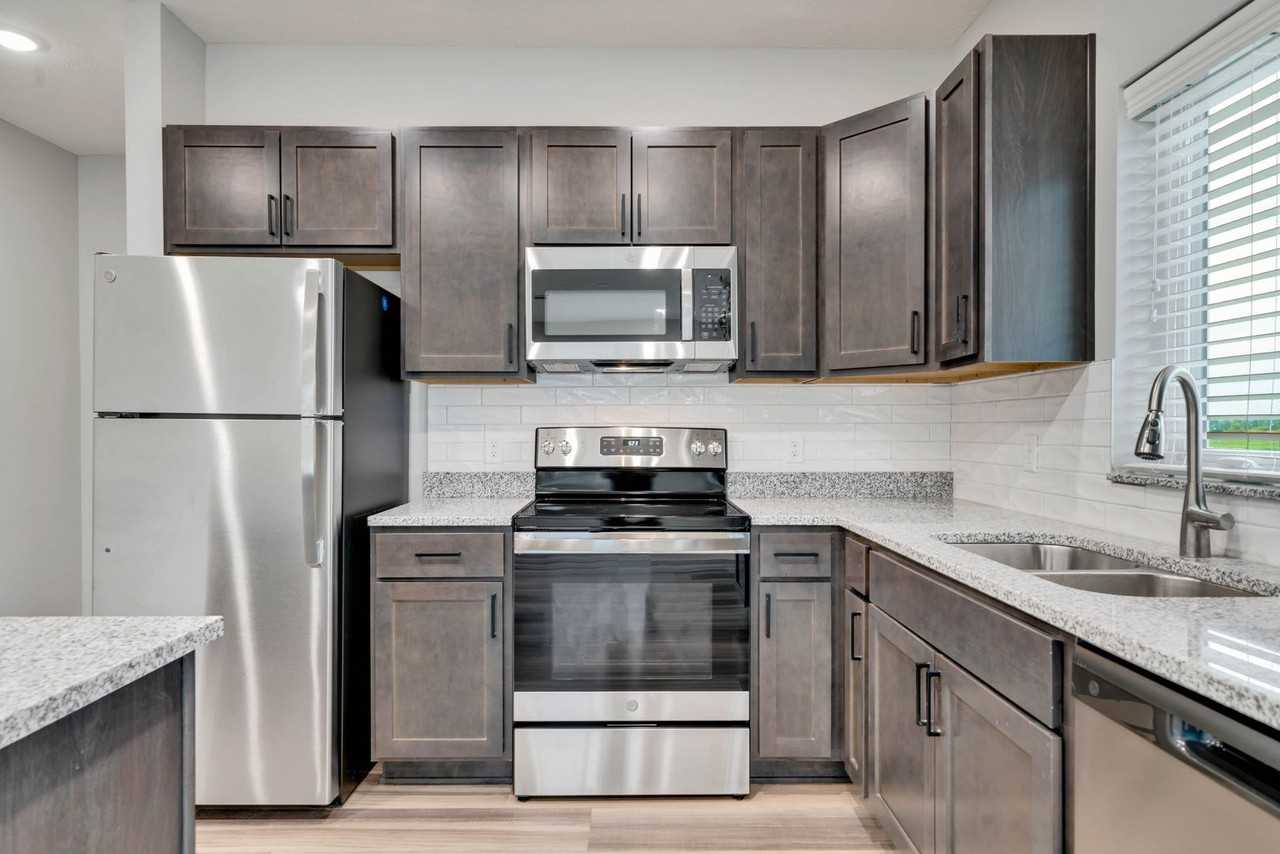 Bluestem Apartments - Photo 2 of 21