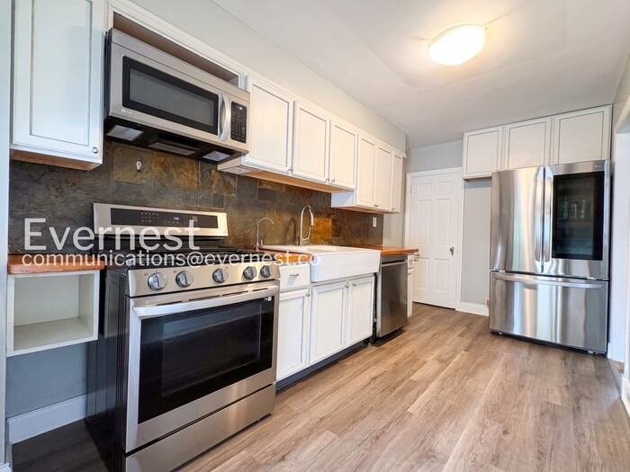 1515 Tunlaw Rd - Photo 6 of 28