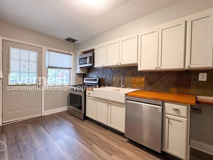 1515 Tunlaw Rd - Photo 7 of 28