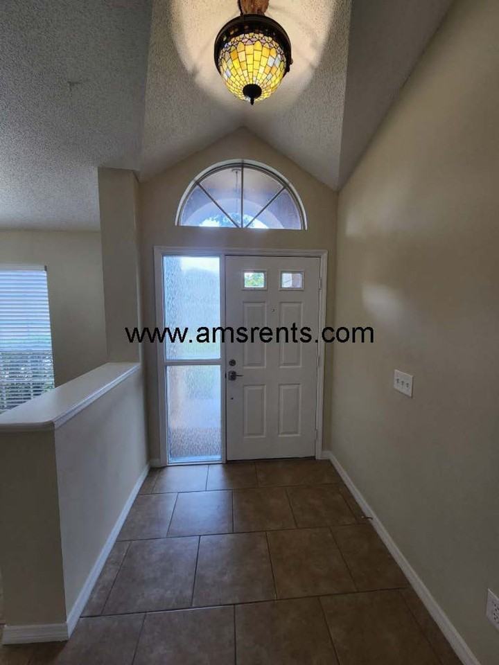 8615 Running Bear Ct - Photo 5 of 32