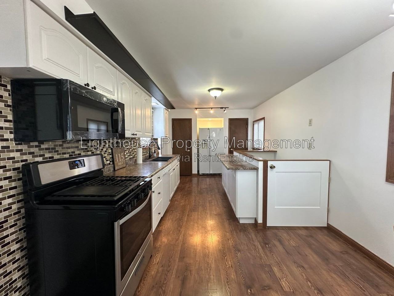 115 30th St N - Photo 3 of 15
