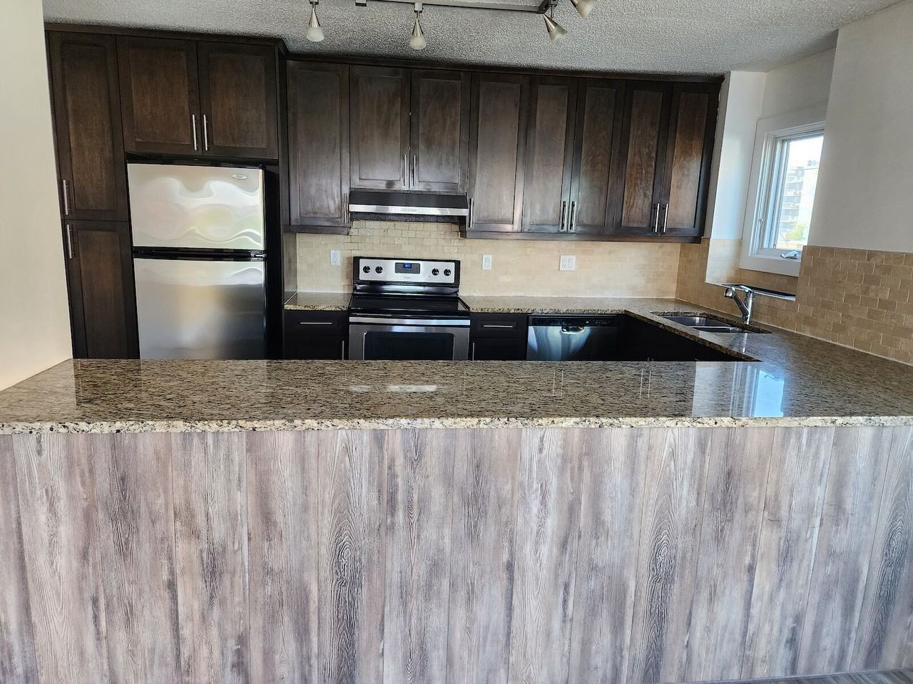 540 14 Ave Sw - Photo 5 of 16