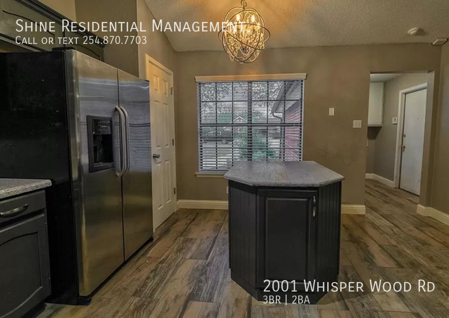 2001 Whisper Wood Rd - Photo 3 of 8