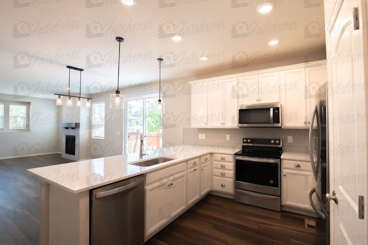 10294 E 59th Ave - Photo 6 of 25