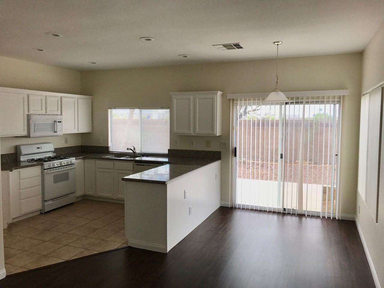 7026 Rustling Winds Ave - Photo 4 of 14