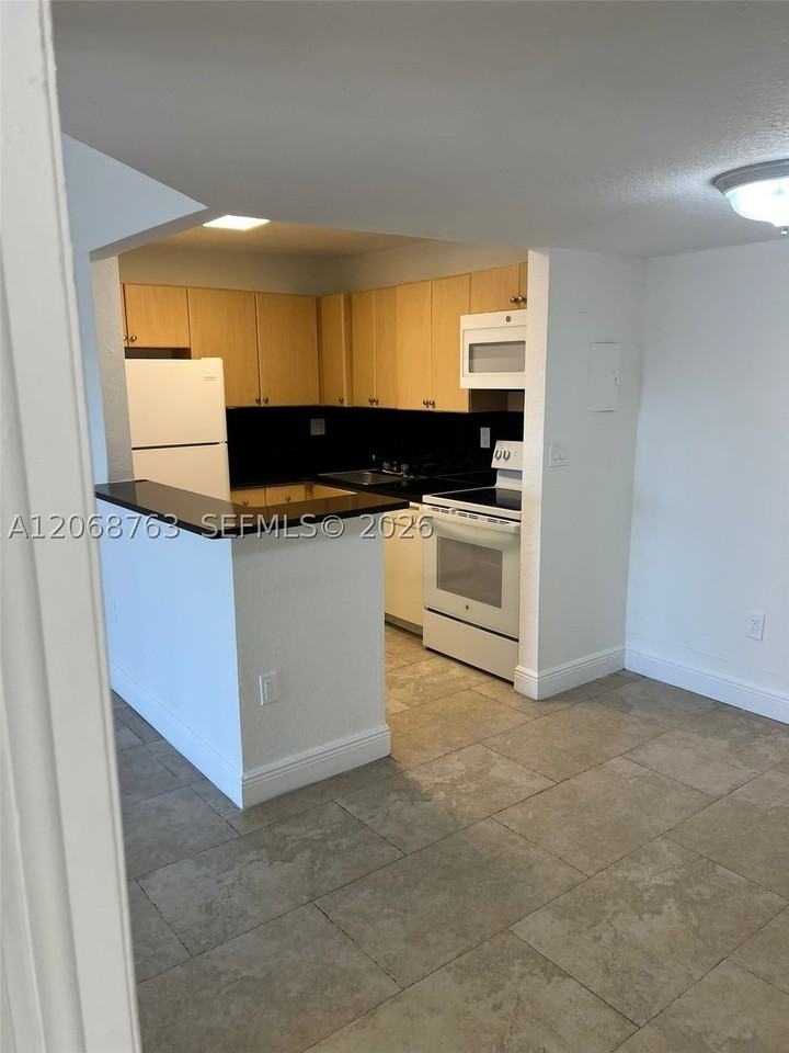 7110 Nw 179th St #310 - Photo 2 of 18