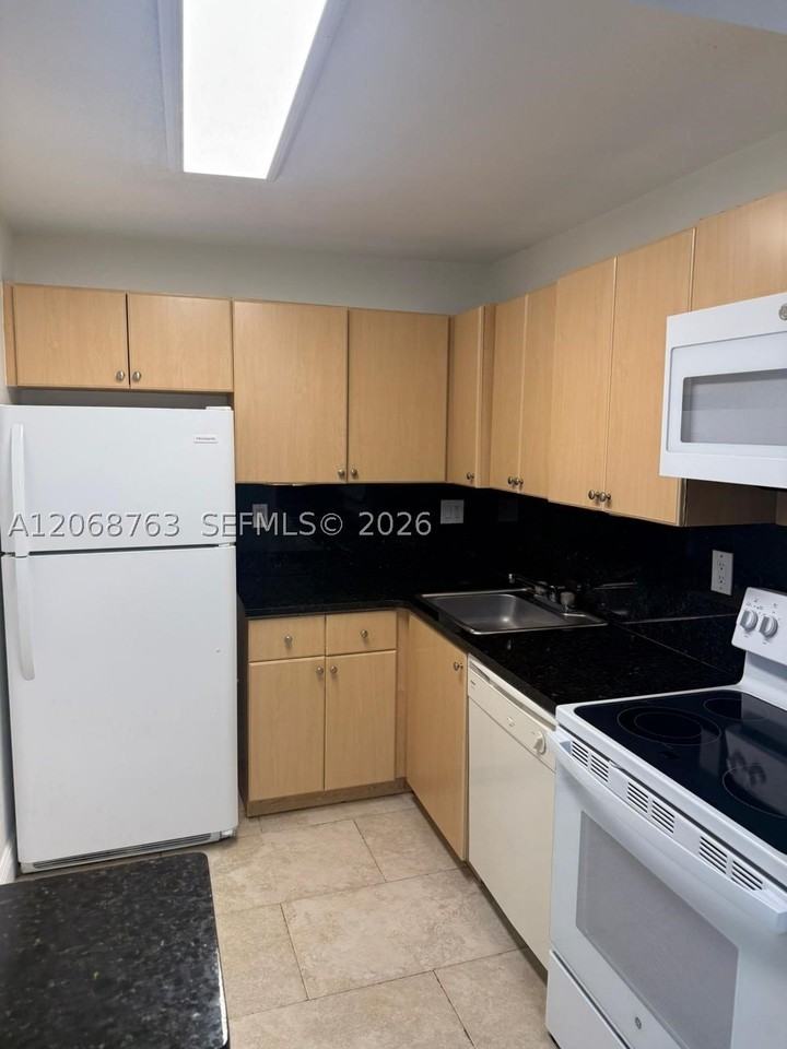 7110 Nw 179th St #310 - Photo 3 of 18