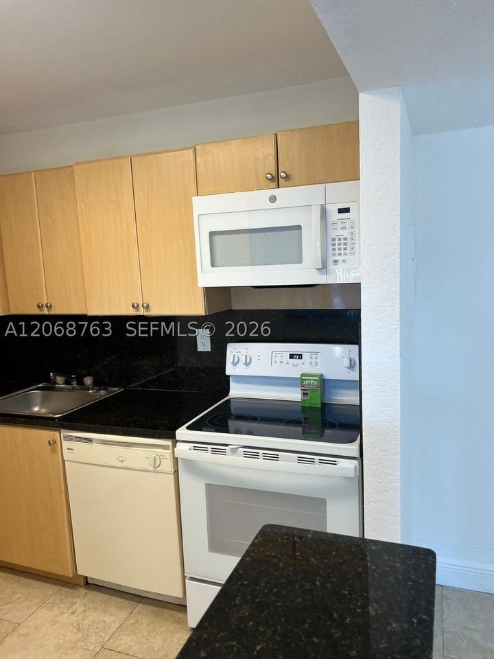 7110 Nw 179th St #310 - Photo 4 of 18